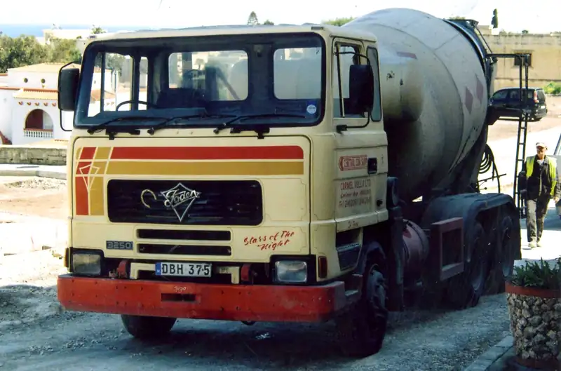 Ready-mix concrete truck parked at a job site on pour day